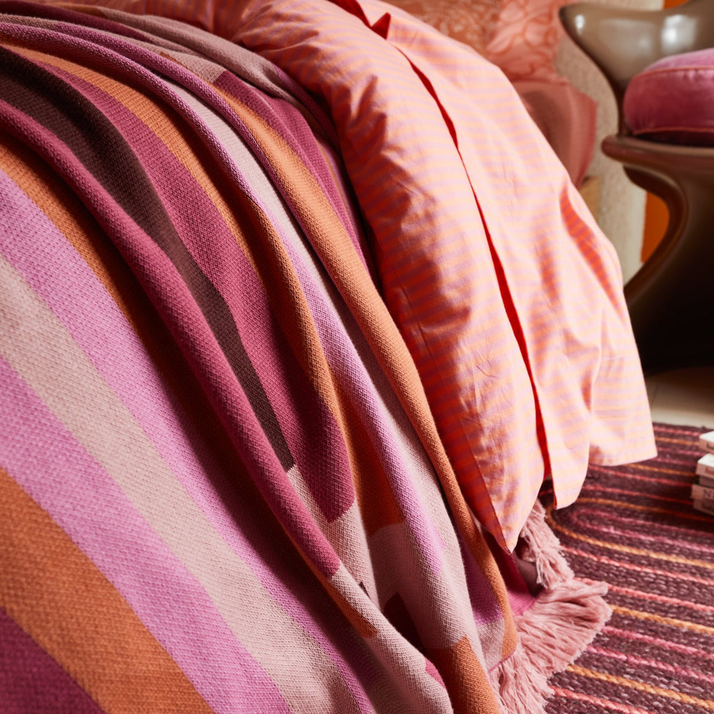 jumbled sage and clare luna collection Aisha knit blanket cotton jacquard pink red orange fringe stripe aztec throw collar bright fun bed bedding bedroom living lounge jumbledonline australia