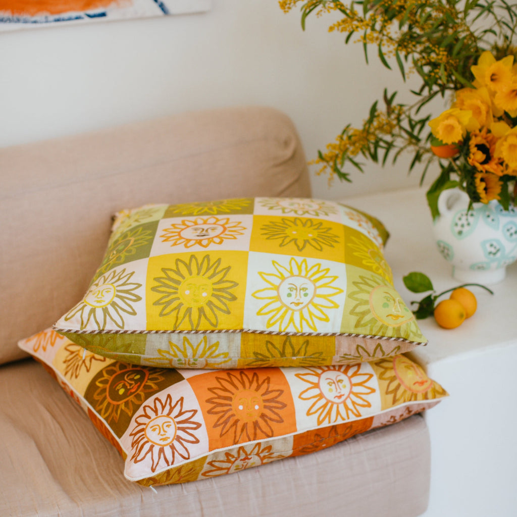 jumbled online x bonnie and neil here comes the sun cushion collaboration. A beautiful hand painted face checker board, on a feather filled linen cushion.