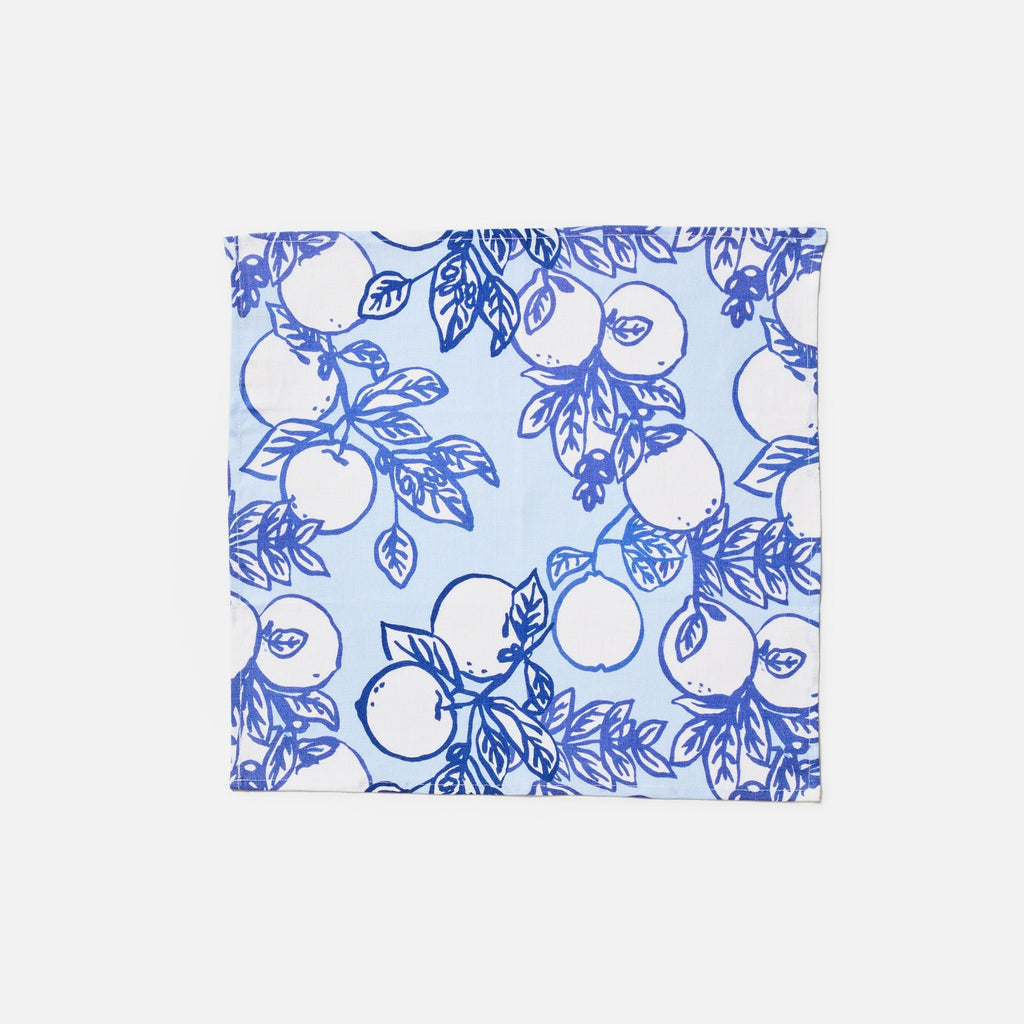 jumbled x bonnie and neil citrone linen napkin set. Hand painted lemons on branches in classic yves klein blue on a soft blue background